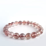 Red copper rutilated quartz crystal bracelet. Genuine natural and unheated gemstone with Certificate of Authenticity