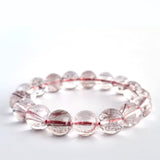 Red copper rutilated quartz crystal bracelet. Genuine natural and unheated gemstone with Certificate of Authenticity