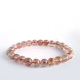 Red copper rutilated quartz crystal bracelet. Genuine natural and unheated gemstone with Certificate of Authenticity