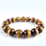 Tiger Eye crystal bracelet collection. Genuine natural and unheated gemstone with Certificate of Authenticity