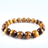 Tiger Eye crystal bracelet collection. Genuine natural and unheated gemstone with Certificate of Authenticity