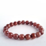 Red copper rutilated quartz crystal bracelet. Genuine natural and unheated gemstone with Certificate of Authenticity