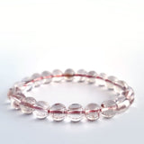 Red copper rutilated quartz crystal bracelet. Genuine natural and unheated gemstone with Certificate of Authenticity