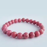 Rhodonite crystal bracelet collection. Genuine natural and unheated gemstone with Certificate of Authenticity