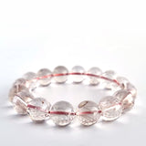 Red copper rutilated quartz crystal bracelet. Genuine natural and unheated gemstone with Certificate of Authenticity