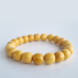 Burmese Yellow Jade apple-beads bracelet. Genuine unheated crystal gemstone with Certificate of Authenticity