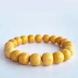 Burmese Yellow Jade apple-beads bracelet. Genuine unheated crystal gemstone with Certificate of Authenticity